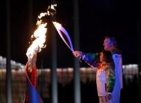 former-hockey-player-vladislav-tretiak-back-and-figure-skater-irina-rodnina-light-the-olympic-cauldron-during-the-opening-ceremony-of-the-2014-sochi-winter-olympics-feb-7-2014-matt-slocum-reuters