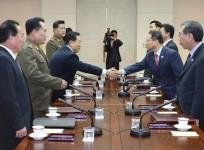 head-of-the-north-korean-high-level-delegation-won-tong-yon-3rd-l-shakes-hands-with-his-south-korean-counterpart-kim-kyou-hyun-2nd-r-during-their-talks-at-the-peace-house-on-the-southern-side-of-the-truce-village-of-panmunjom-in-the-demilitarised-zon