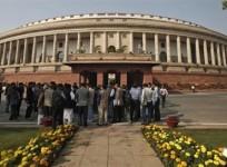 people-stand-in-front-of-the-indian-parliament-building-representational-picture