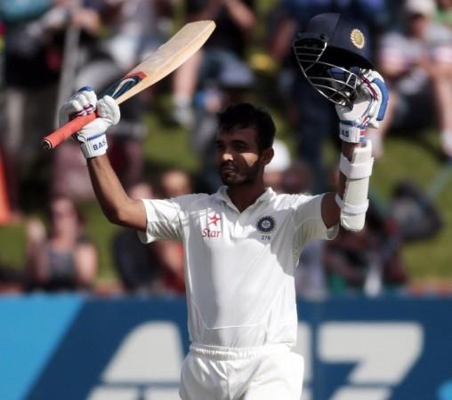 India batsman Ajinkya Rahane celebrates after completing his maiden Test century in the second Test against New Zealand, 15 February. Reuters Ajinkya Rahane India