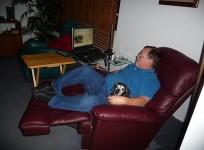 sitting, watching TV, computer