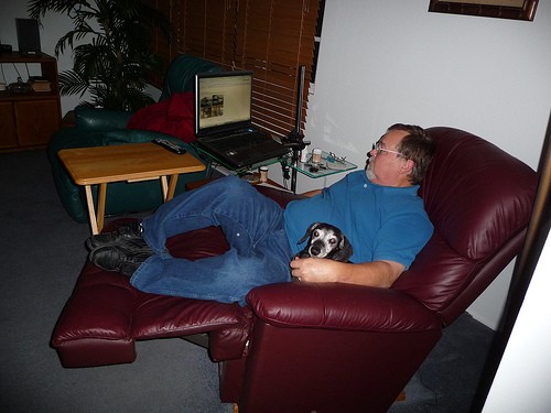 sitting, watching TV, computer