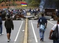 supporters-of-opposition-leader-leopoldo-lopez-stand-at-a-barricade-during-a-protest-against-nicolas-maduro039s-government-in-a-middle-class-neighbourhood-in-caracas-february-20-2014-reuters