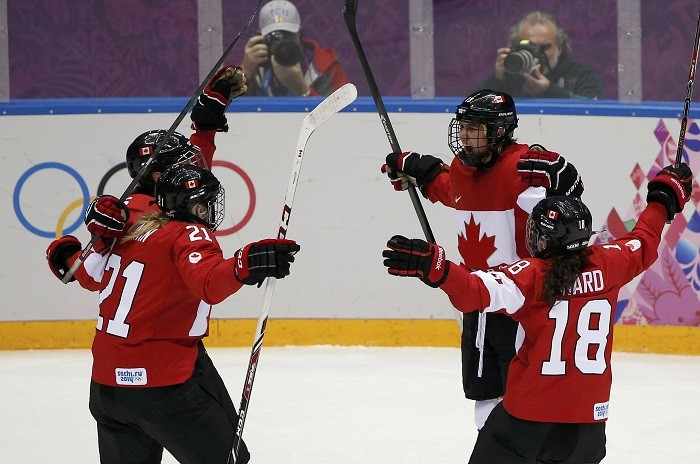 Canada's Jenner celebrates her goal against Team USA with teammates including Irwin and Ward during their women's ice hockey gold medal game at Sochi 2014 Winter Olympic Games, 20 February Time to Celebrate