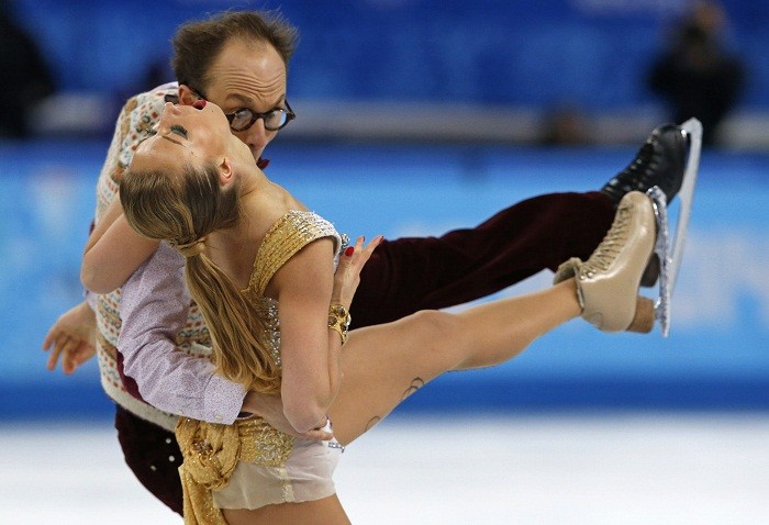 Germany's Nelli Zhiganshina (L) and Alexander Gazsi compete during the figure skating ice dance short dance program at the Sochi 2014 Winter Olympics, 16 February. Caught Awkward!