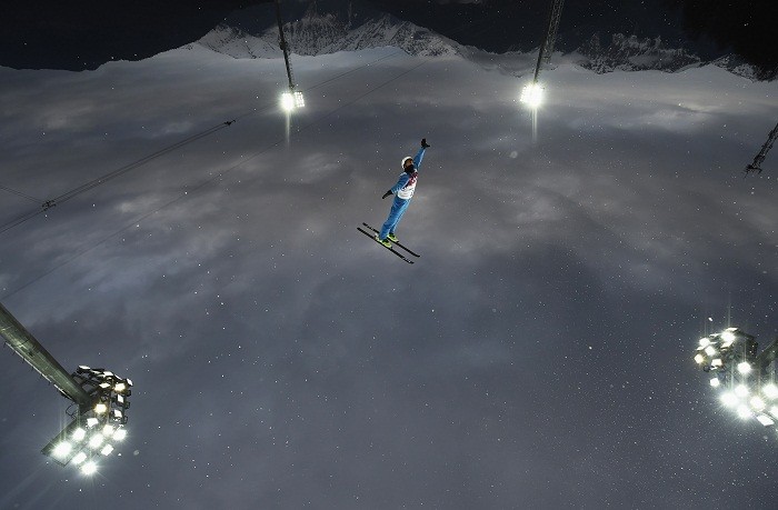 Belarus' Anton Kushnir competes during the men's freestyle skiing aerials qualification round at the 2014 Sochi Winter Olympic Games in Rosa Khutor, 17 February. Sky is the Limit