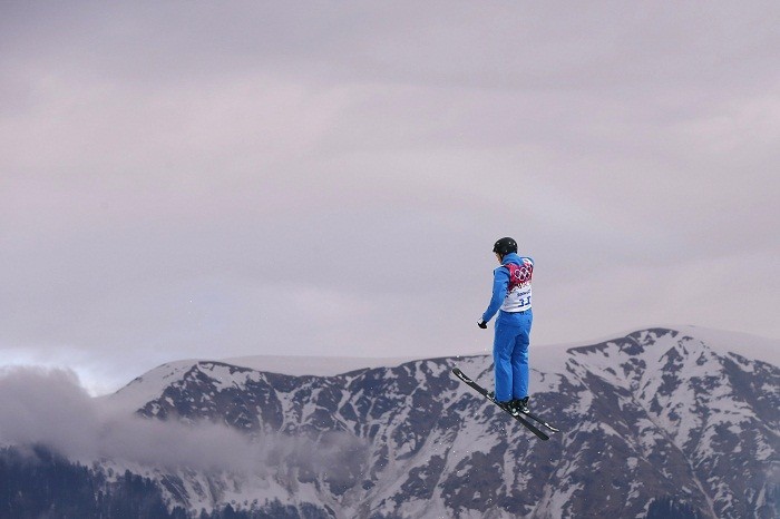Belarus' Dmitri Dashinski performs a jump during the men's freestyle skiing aerials qualification round at the 2014 Sochi Winter Olympic Games in Rosa Khutor, 17 February Unparalleled View