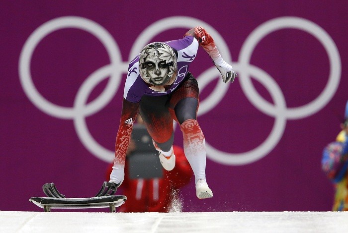 Canada's Sarah Reid starts in a women's skeleton training session during the 2014 Sochi Winter Olympic Games at the Sanki Sliding Center in Rosa Khutor, 11 February. Stand Apart