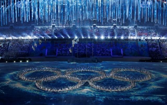 Performers form the Olympic rings during a show at the closing ceremony for the 2014 Sochi Winter Olympics, February 23, 2014. (Reuters) Sochi Olympics