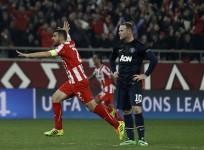 maniatis-olympiakos-wayne-rooney-manchester-united