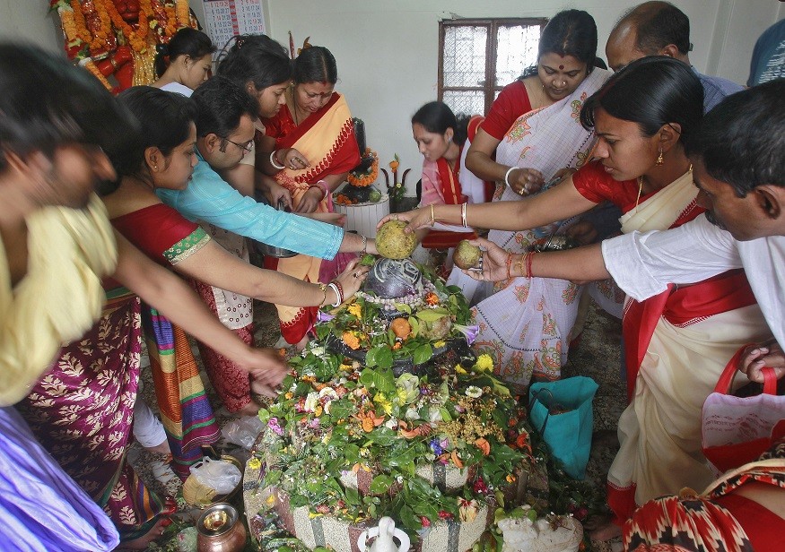 Hindu devotees place their offerings on a Shivling (a symbol of Lord Shiva) while praying inside a temple on the occasion of the Mahashivratri festival in Agartala, capital of India's northeastern state of Tripura Hindu devotees place their offerings on a Shivling (a symbol of Lord Shiva) while praying inside a temple on the occasion of the Mahashivratri festival in Agartala, capital of India's northeastern state of Tripura