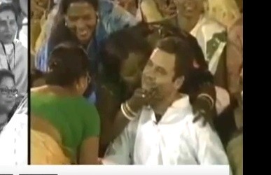 You Tube Scree shot where an Assam woman is seen kissing Rahul Gandhi