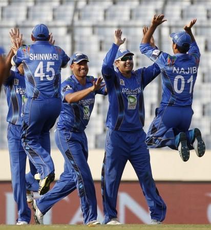Afghanistan bowlers celebrate a Sri Lanka wicket, 3 March. Reuters. Asia Cup 2014
