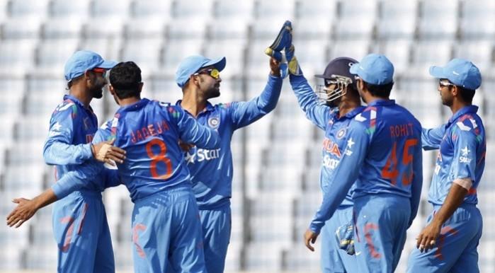 India players celebrate an Afghanistan wicket in their Asia Cup 2014 game, 5 March. Reuters India