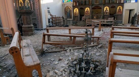 A fallen chandelier lies on debris in Im Al-Zinar church that was damaged during an air-raid in December,2013/Reuters A fallen chandelier lies on debris in Im Al-Zinar church that was damaged during an air-raid in December,2013/Reuters