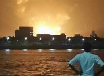 a-man-watches-indian-navy-submarine-ins-sindhurakshak-on-fire-in-mumbai-late-august-13-2013-representational-picture-the-ins-kolkata-in-which-the-gas-leak-took-place-on-friday-is-the-lead-ship-of-the-kolkata-class-guided-missile-destroyers