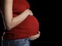 A 65-year-old mother of 13 children, is pregnant with quadruplets