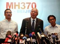 malaysian-pm-najib-addresses-reporters-about-the-missing-malaysia-airlines-flight-mh370-at-kuala-lumpur-international-airport