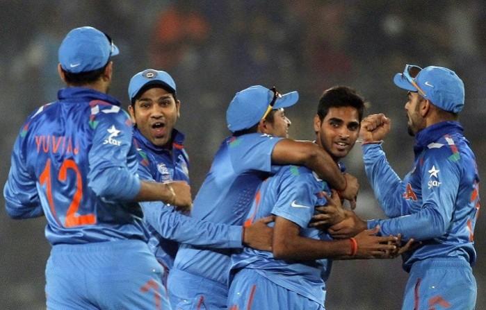 India celebrate after running out Pakistan opener Kamran Akmal in their World T20 game, 21 March. Reuters Bhuvneshwar Kumar India Rohit