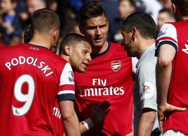 Arsenal need to pick up a victory over Swansea after their horror loss to Chelsea. Reuters Arsenal Oxlade-Chamberlain Giroud Andre Marriner