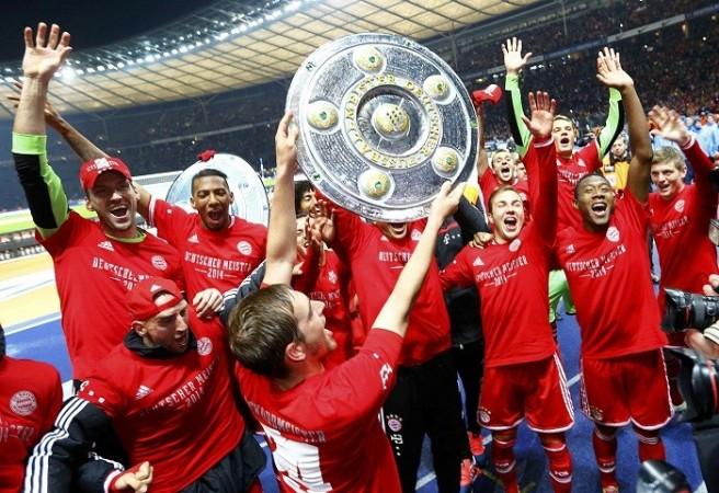 Bayern Munich celebrate after defending their Bundesliga crown, 25 March. Reuters Bayern Munich Bundesliga