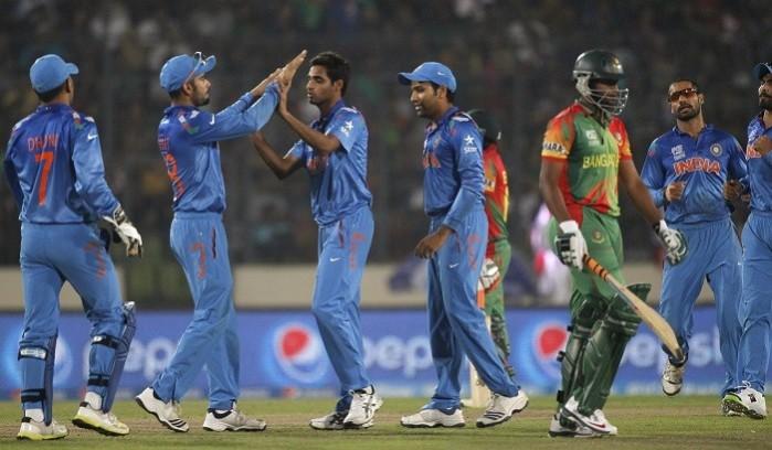 India players celebrate the wicket of Bangladesh batsman Shakib Al Hasan in their ICC World T20 game, 28 March. Reuters India Bangladesh Shakib