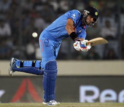 Yuvraj Singh plays a shot through the onside during his half-century in the ICC World T20 match against Australia, 30 March. Reuters Yuvraj Singh India