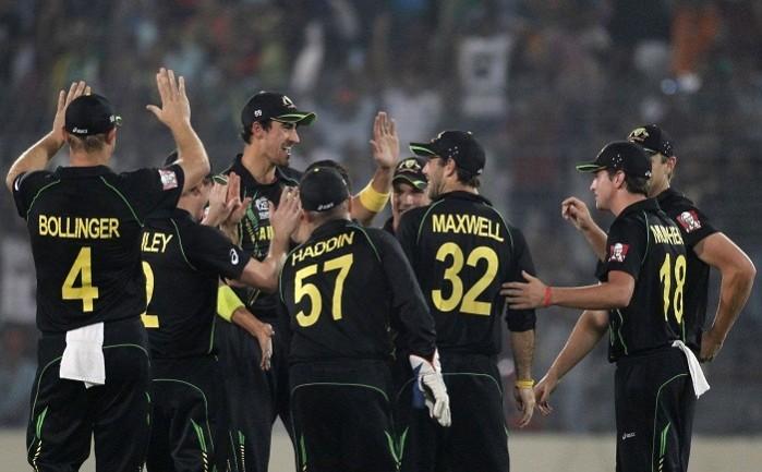 Australia players celebrate a wicket in the ICC World T20 game against India, 30 March. Reuters Australia