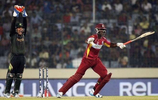 Darren Sammy West Indies Kamran Akmal Pakistan