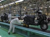 employees-work-at-an-assembly-line-of-activa-scooter-at-honda-motorcycle-and-scooter-india-pvt-ltd-plant-in-tapukara-rajasthan
