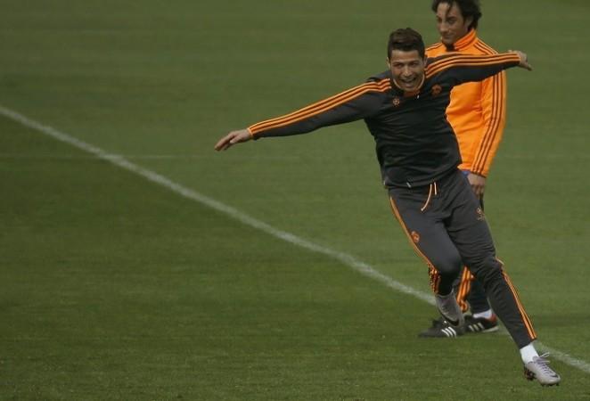Real Madrid superstar Cristiano Ronaldo fools around during a training session, 1 April. Reuters Cristiano Ronaldo Real Madrid