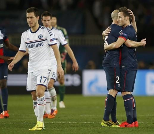 Chelsea playmaker Eden Hazard leaves the pitch as PSG celebrate their victory in the Champions League, 2 April. Reuters Chelsea PSG