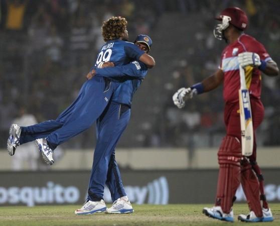 Sri Lanka skipper Lasith Malinga celebrates after castling West Indies opener Dwayne Smith in their ICC World T20 2014 semifinal, 3 April. Reuters Malinga Sri Lanka Dwayne Smith West Indies