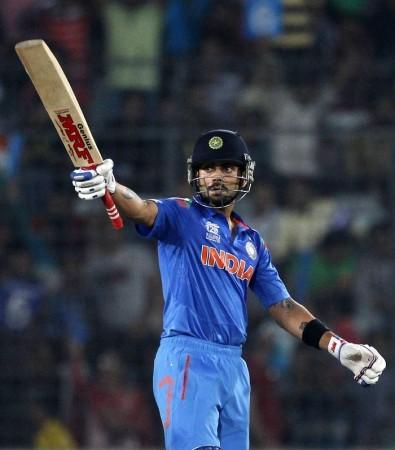 India batsman Virat Kohli celebrates his half-century against South Africa, 4 April. Reuters Virat Kohli India