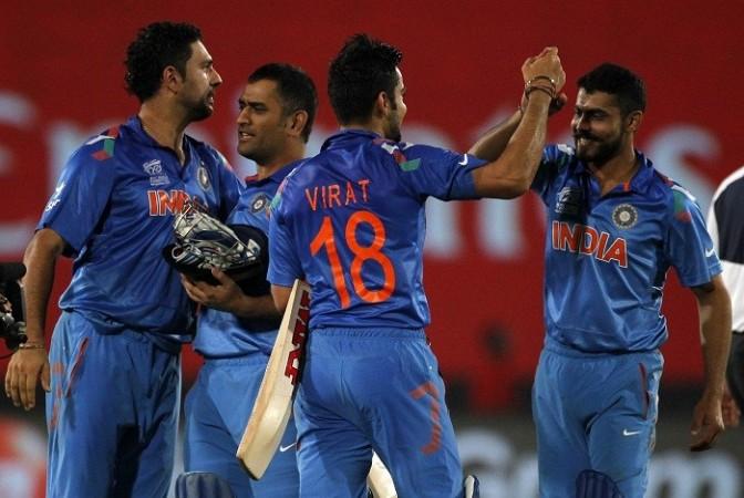 India celebrate their win over South Africa in the semifinals of the ICC World T20, 4 April. Reuters Yuvraj Dhoni Kohli Jadeja India