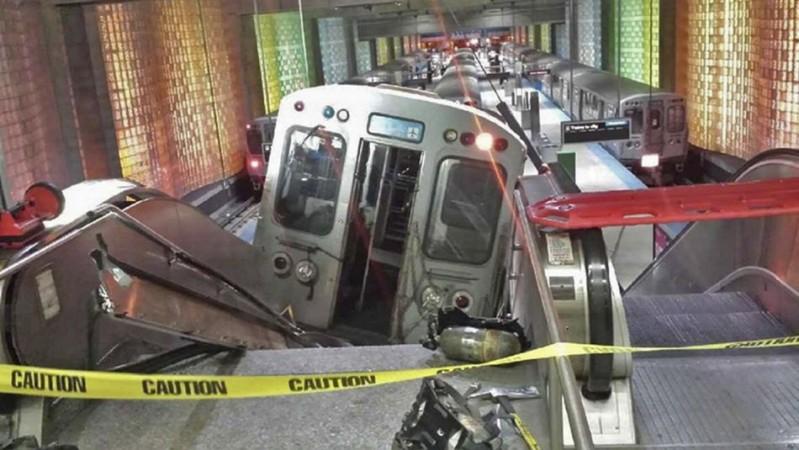 A derailed commuter train rests on an escalator at O'Hare international airport in Chicago (Photo: Reuters)