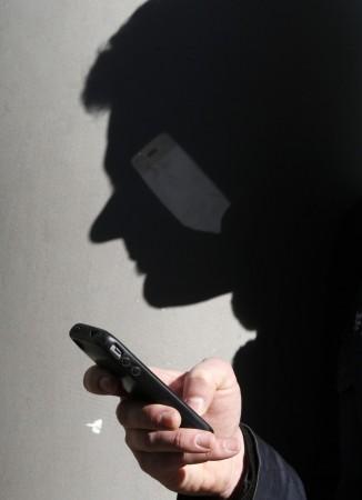 A man using his smartphone