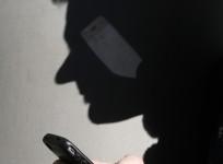 a-man-using-his-smartphone