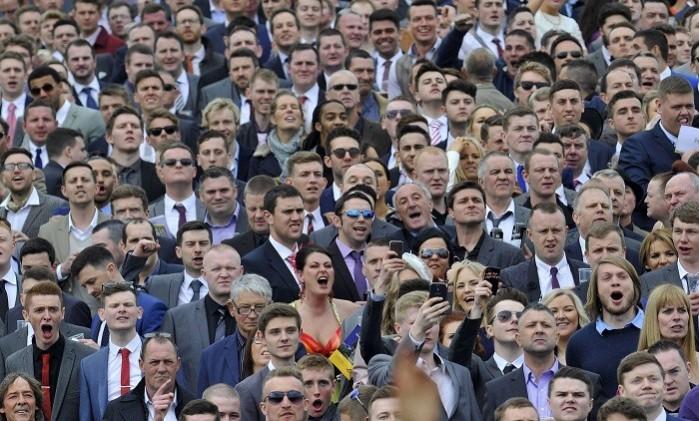 Racegoers enjoy the action at Aintree. Reuters Aintree Grand National