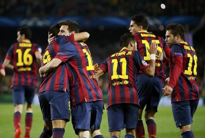 Barcelona players celebrate a goal against Atletico Madrid in the Champions League, 1 April. Reuters Barcelona