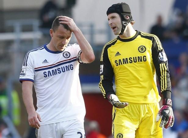 Chelsea's Petr Cech (left) is happy to continue with Chelsea Petr Cech