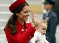 catherine-the-duchess-of-cambridge-holds-her-son-prince-george-after-disembarking-their-plane-with-her-husband-britains-prince-william-after-arriving-in-wellington