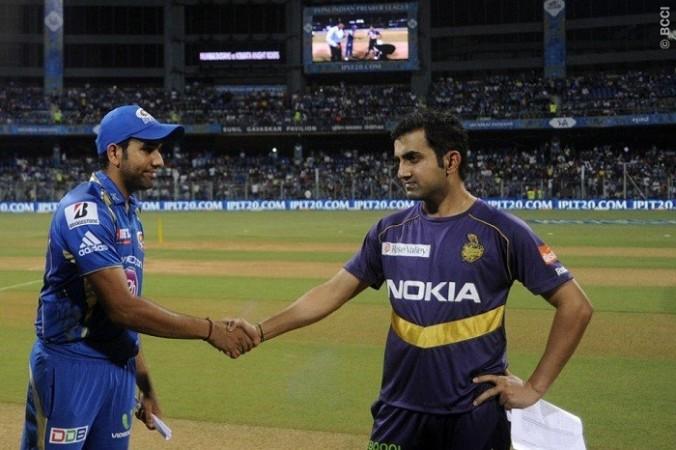 IPL 7 begins with a match betwee the defending champions Mumbai Indians and the Kolkata Knight Riders. Pal Pillai/IPL/SPORTZPICS Rohit Sharma Gautam Gambhir Mumbai Indians KKR