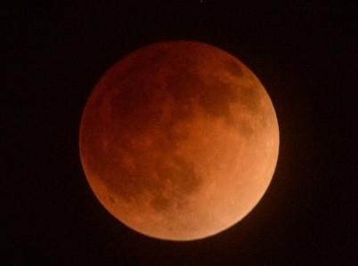 The moon is shown in eclipse from Los Angeles (Reuters) The moon is shown in eclipse from Los Angeles (Reuters)