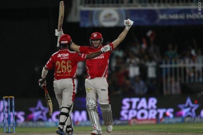 David Miller and Cheteshwar Pujara celebrate their win over the Rajasthan Royals, 20 April. Ron Gaunt/IPL/SPORTZPICS David Miller Cheteshwar Pujara Kings XI Punjab