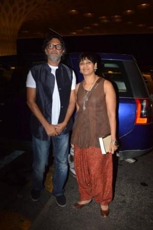 Rakyesh Omprakash Mehra seen here with wife P. S. Bharathi