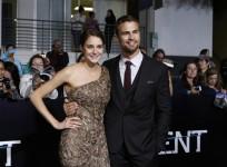 cast-members-shailene-woodley-and-theo-james-pose-at-the-premiere-of-quotdivergentquot-in-los-angeles