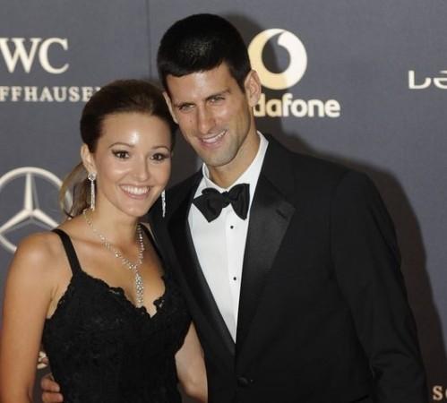 Djokovic poses with his girlfriend. Reuters Djokovic