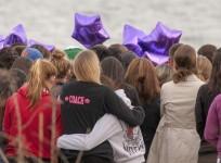people-gather-at-the-beach-for-a-vigil-in-honor-of-slain-student-maren-sanchez-in-milford