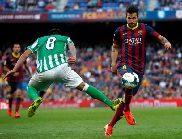 Arsenal manager Arsene Wenger believes Cesc Fabregas is content about his move to Chelsea cesc fabregas